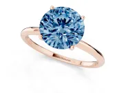 Fancy Blue Round Cut Diamond Solitaire Engagement Ring Set in Rose gold with Thin Band and Prong Setting