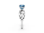 Fancy Blue Princess Cut Diamond Solitaire Ring Set in White gold with Side Stones on Criss-Cross Band and Prong Setting
