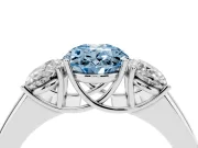 Fancy Blue Three-Stone Oval Cut Diamond Ring Set in Platinum with Matching Prong Settings and Plain Band