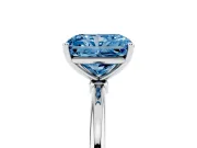 Fancy Blue Radiant Cut Diamond Solitaire Engagement Ring Set in White gold with Thin Band and Prong Setting
