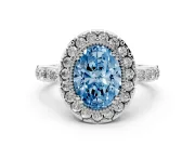 Fancy Blue Oval Cut Diamond Halo Ring Set in White gold with Pavé Shank and Prong Setting