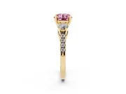 Fancy Pink Three-Stone Round Cut Diamond Pavé Band Ring Set in Yellow gold with Prong-Set Trio