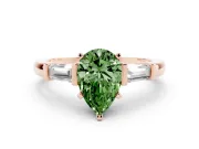 Fancy Green Pear Cut Diamond Solitaire Ring Set in Rose gold with Tapered Baguette Accents and Prong Setting