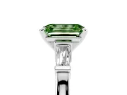 Fancy Green Emerald Cut Diamond Solitaire Ring Set in Platinum with Tapered Baguette Accents and Prong Setting