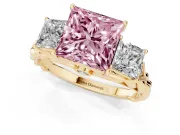 Fancy Pink Princess Cut Diamond Three-Stone Ring Set in Yellow gold with Braided Band