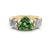 Fancy Green Heart Cut Diamond Three-Stone Ring Set in Yellow gold with Pavé Band