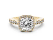 Cushion Cut Diamond Halo Engagement Ring Set in Yellow gold with Pavé Band and Prong Setting