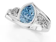 Fancy Blue Pear Cut Diamond Bezel Bypass Ring Set in Platinum with Round Accents