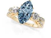 Fancy Blue Marquise Cut Diamond Three-Stone Ring Set in Yellow gold with Pavé Split Shank and Prong Setting
