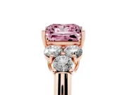 Fancy Pink Princess Cut Diamond Cluster Ring Set in Rose gold with Round Accent Stones and Prong Setting on a Plain Band