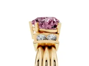 Fancy Pink Three-Stone Heart Cut Diamond Channel Set Ring Set in Yellow gold with Bar Prongs