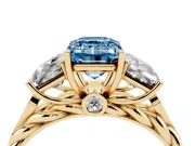 Emerald Cut Three Stone Engagement Ring Setting for a Fancy Blue Lab-Grown Diamond | Braided Band | Yellow Gold