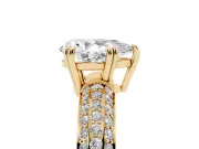 Pear Cut Diamond Solitaire Ring Set in Yellow gold with Multi-Row Round Pavé Band and Prong Setting