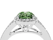 Fancy Green Oval Cut Diamond Halo Split Shank Pavé Ring Set in White gold with Prong Setting