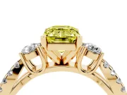 Fancy Yellow Emerald Cut Diamond Three-Stone Ring Set in Yellow gold with Pavé Split Shank and Prong Setting