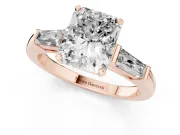 Radiant Cut Diamond Solitaire Ring Set in Rose gold with Tapered Baguette Side Stones and Prong Setting