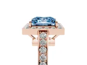 Fancy Blue Princess Cut Diamond Halo Pavé Engagement Ring Set in Rose gold with Bezel Setting