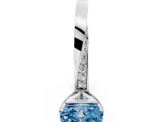 Fancy Blue Radiant Cut Diamond Engagement Ring Set in Platinum with Side Stone Accents and Prong Setting