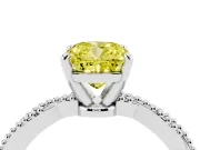 Fancy Yellow Cushion Cut Diamond Solitaire Ring Set in Platinum with Twisted Band and Bead Prong Setting