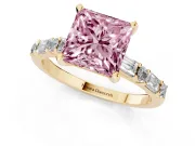 Fancy Pink Princess Cut Diamond Solitaire Set in Yellow gold with Side Baguettes and Channel Set Band