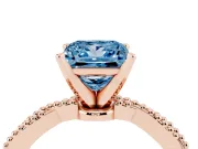 Fancy Blue Princess Cut Diamond Solitaire Ring Set in Rose gold with Twisted Band and Bead Prong Setting
