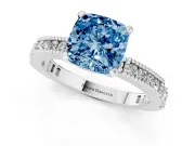 Fancy Blue Cushion Cut Diamond Solitaire Ring Set in White gold with Slim Pavé Band and Prong Setting