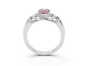Fancy Pink Oval Cut Diamond Cluster Ring Set in Platinum with Round Accent Stones and Prong Setting on a Plain Band