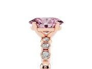 Fancy Pink Oval Cut Diamond Solitaire Engagement Ring Set in Rose gold with Bezel Accents on Beaded Band