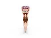 Fancy Pink Three-Stone Radiant Cut Diamond Channel Set Ring Set in Rose gold with Bar Prongs