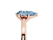 Fancy Blue Pear Cut Diamond Solitaire Engagement Ring Set in Rose gold with Prong Setting on a Classic Band