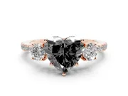 Fancy Black Heart Cut Diamond Three-Stone Ring Set in Rose gold with Pavé Band and Graduated Sides