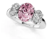 Fancy Pink Oval Cut Diamond Three-Stone Ring Set in Silver with Polished Band and Prong Setting