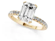 Emerald Cut Diamond Brilliant Solitaire Set in Yellow gold with Pavé Band and Claw Prong Setting