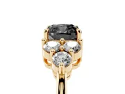 Fancy Black Cushion Cut Diamond Solitaire Ring Set in Yellow gold with Cluster Accents on Each Side