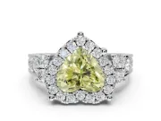 Heart-Shaped Halo Engagement Ring Setting for a Fancy Yellow Lab-Grown Diamond | Graduated Channel Band | White Gold