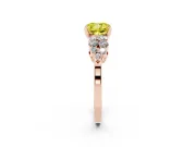 Fancy Yellow Cushion Cut Diamond Cluster Engagement Ring Set in Rose gold with Pavé Band and Prong Setting