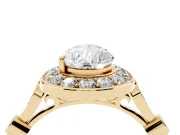 Pear Cut Diamond Halo Engagement Ring Set in Yellow gold with Twisted Band and Prong Setting