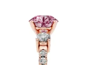 Fancy Pink Three-Stone Round Cut Diamond Pavé Band Ring Set in Rose gold with Prong Setting