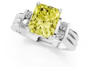 Fancy Yellow Three-Stone Radiant Cut Diamond Channel Set Ring Set in White gold with Bar Prongs