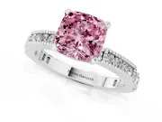 Fancy Pink Cushion Cut Diamond Solitaire Ring Set in Platinum with Slim Pavé Band and Prong Setting