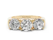Round Cut Diamond Three-Stone Ring Set in Yellow gold with Channel Band and Sturdy Prongs