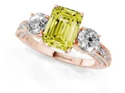 Fancy Yellow Emerald Cut Diamond Three-Stone Ring Set in Rose gold with Round Side Stones and Pavé Band