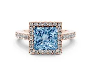 Fancy Blue Princess Cut Diamond Halo Pavé Solitaire Ring Set in Rose gold with Prong-Set Center Stone