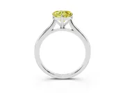 Fancy Yellow Heart Cut Diamond Solitaire Ring Set in White gold with Cathedral Band and Prong Setting