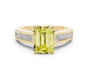Fancy Yellow Emerald Cut Diamond Solitaire Ring Set in Yellow gold with Channel-Set Band and Prong Setting