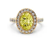 Fancy Yellow Oval Cut Diamond Halo Ring Set in Yellow gold with Pavé Shank and Prong Setting