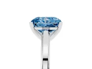 Fancy Blue Radiant Cut Diamond Solitaire Ring Set in Silver with Prong Setting and Classic Band