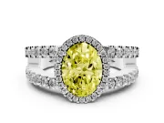Fancy Yellow Oval Cut Diamond Halo Ring Set in Platinum with Pavé Split Shank and Prong Setting