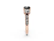 Fancy Black Cushion Cut Diamond Three-Stone Ring Set in Rose gold with Pavé Band