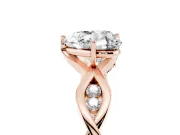 Heart Cut Diamond Twist Band Solitaire Ring Set in Rose gold with Leaf Prong Setting and Accent Stones
